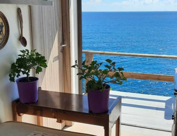 Interior and sea view from Ntounas Apartment in Agios Nikolaos Crete (edit)